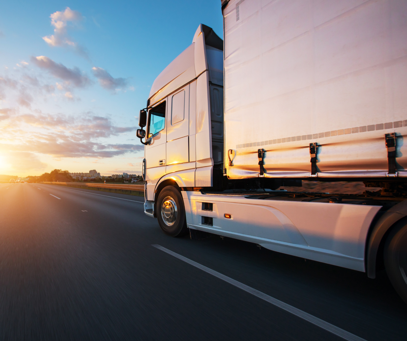 truck on the road with sunset 