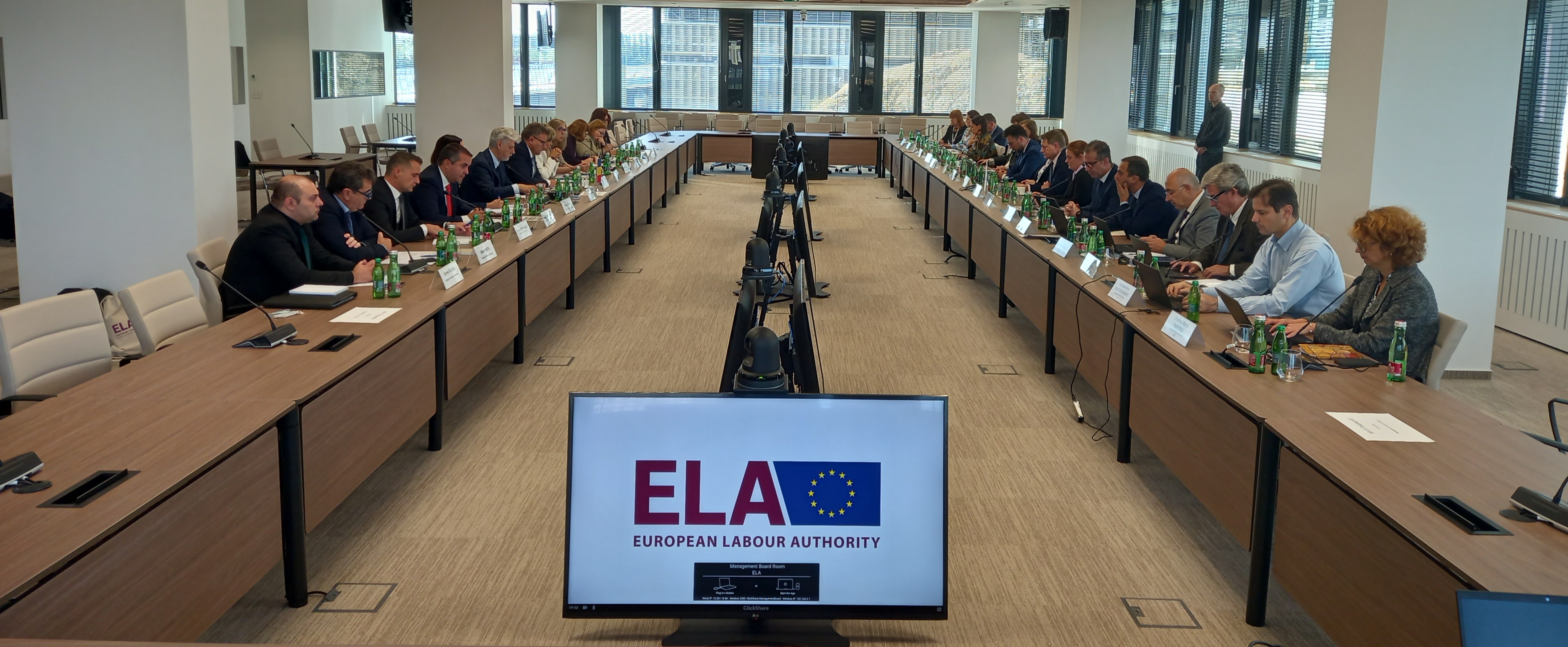 people around the table at EHA headquarters 