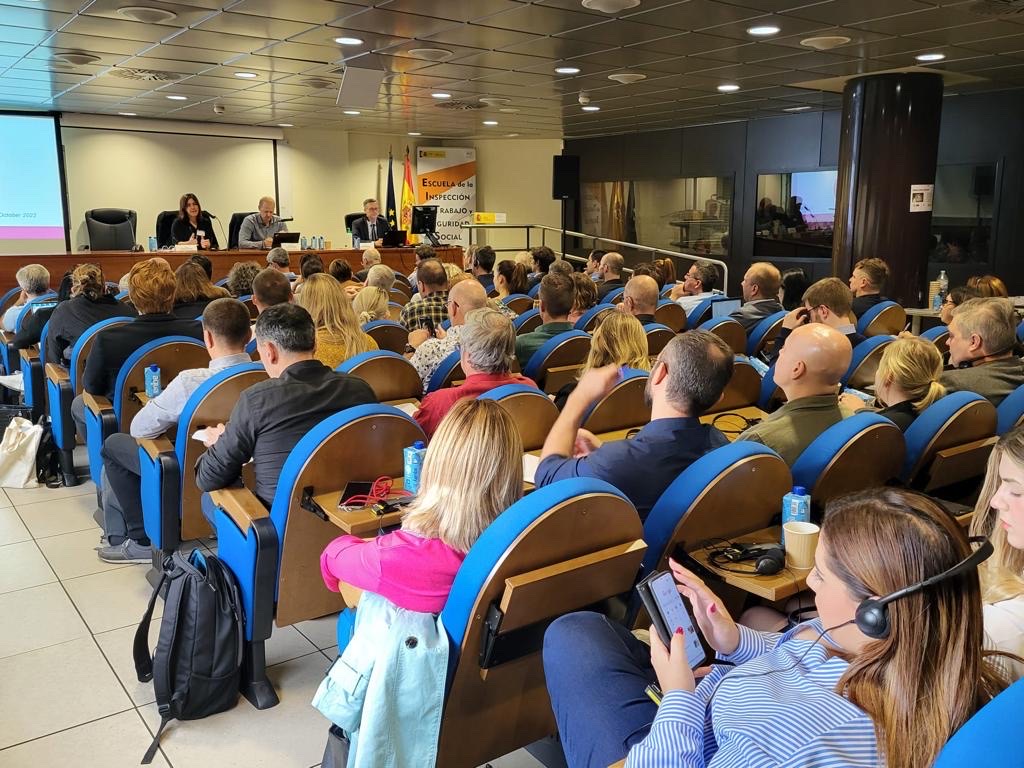 people gathering in a room attending the workshop in Madrid