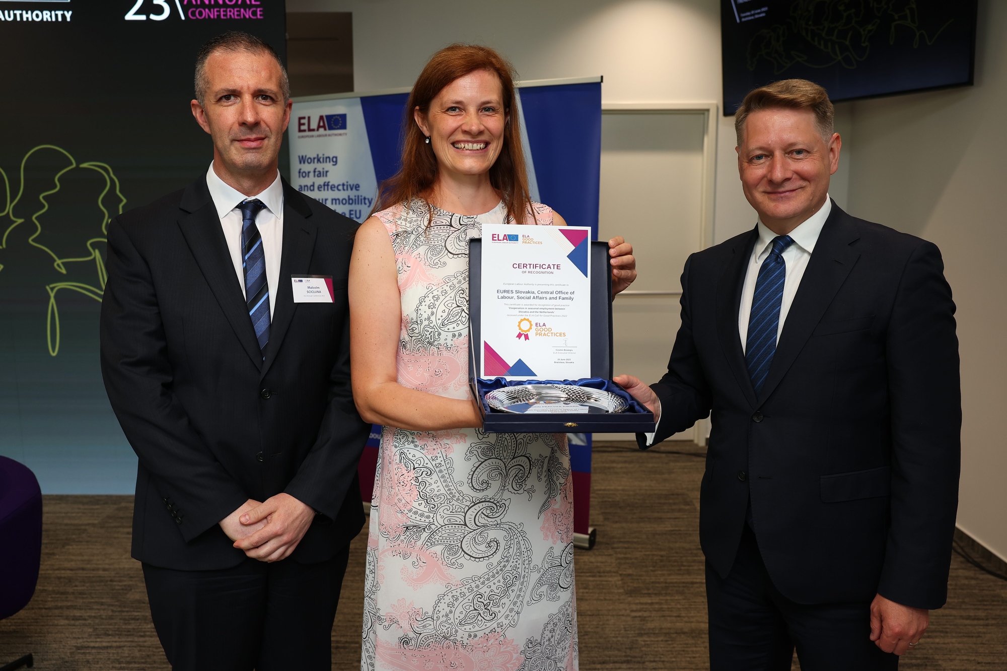 ELA's executive director and the head of cooperation support posing with the EURES Slovakia representative, receiving the Call for Good Practices award