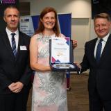 ELA's executive director and the head of cooperation support posing with the EURES Slovakia representative, receiving the Call for Good Practices award